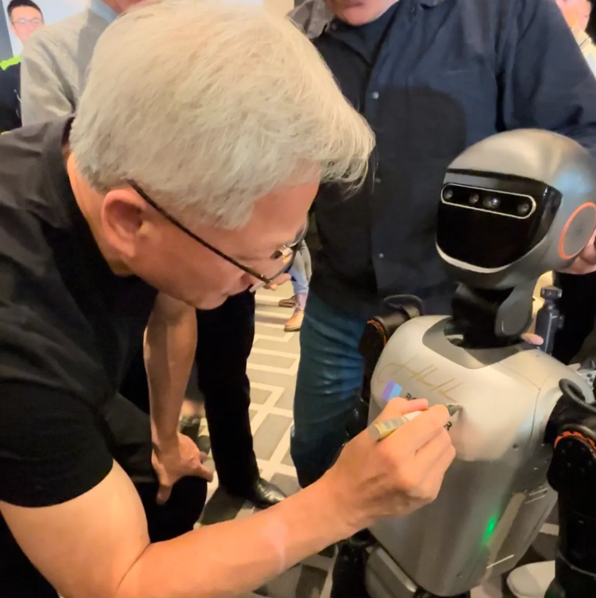 Booster T1 at NVIDIA's Spring Party, Ships in Global Volumes and Gets Signed by Jen-Hsun Huang